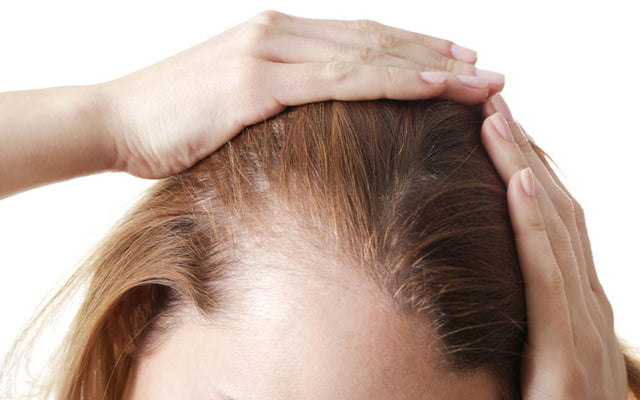How & Why You Need To Protect Your Hair From A Helmet