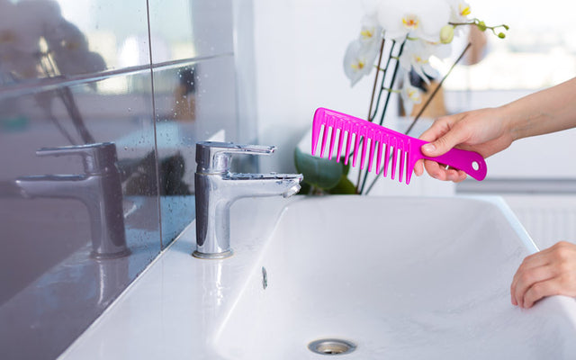 You're Probably Not Cleaning Your Hairbrush As Often As You Should Be